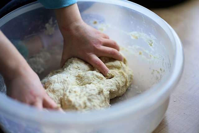 Gradually add the dry ingredients to the wet ingredients